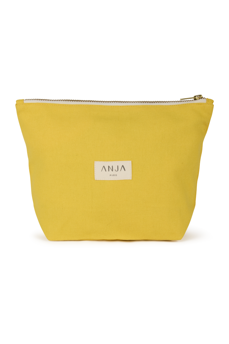 anja accessories the yellow pouch behind