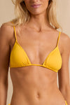 anja triangle bikini top le pétillant yellow close up face